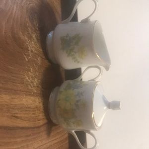 Beautiful n like new. 3 pc fine China creamer n sugar set. Spring colors n gold